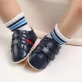 Close-up of navy blue baby pre-walker shoes with anti-slip soft soles for infants 0-1 year old. - Dark Blue