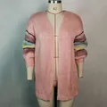 Detailed macro view of pink mohair cardigan with vibrant rainbow striped knit sleeves - S / Tops / Pink