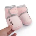 Close-up of pink fleece baby winter boots featuring heart embroidery detail and soft texture. - 11cm / 48g / Pink