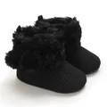 Black knitted baby booties with cozy faux fur trim and cute pom-poms for girls - Black