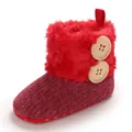 Warm red baby snow boots featuring soft fleece lining and decorative wooden buttons - Red