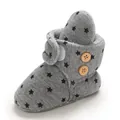 Detail view of grey baby bootie with black star pattern and wooden buttons - Dark Gray