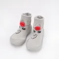 Detail view of grey knitted baby walking shoes with cute cartoon face and red lip design - Size 18/19 / Gray Duck Mouth