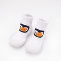 Detail view of white baby knit walker shoes with a cute 3D cartoon penguin face - Size 18/19 / White Duck Mouth