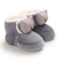 Detail view of the cute cat face embroidery and soft corduroy fabric on baby winter boots - Gray (Bear)