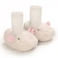 Detail view of white fuzzy sheep-style baby booties with pink ears and soft knitted sock cuffs - 11cm / Sheep Style (B264) / White Sheep