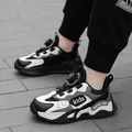 Atmungsaktive Mädchen Sportschuhe in Schwarz und Weiß mit praktischem Drehverschluss. - 38 / Schwarz Weiß Mesh