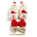 Detailansicht der Weihnachts-Babyschuhe aus Fleece mit Weihnachtsmann und Schleifen. - 12cm / Weihnachtsmann / Schuhe mit Stirnband / Weiß
