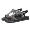 Sandales plates noires élégantes pour femmes avec des motifs floraux en strass - 35 / Noir