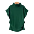 Detailed macro view showing the dark green fabric of this plus size mock neck batwing top - Dark Green