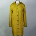 Detailed front view of a long mustard yellow hooded knit cardigan sweater for women. - S / Tops / Yellow