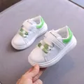 Sneakers in pelle bianca per bambini con dettagli verde lime e chiusura a strappo - Bianco-Verde