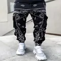 Streetwear black paisley print cargo harem pants with multiple side pockets for men - Black