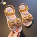 Charming girls summer sandals featuring sparkly golden bow detail and soft flat soles - 24 / Yellow