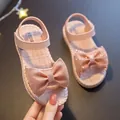 Charming pink girl's sandals featuring a large glittery bow and woven texture sole - 24 / Pink