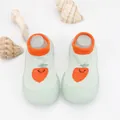 Close-up of breathable knit baby walking shoes with a cute carrot pattern detail - Grass Green Carrot