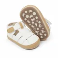 White and tan infant closed-toe sandals with non-slip footprint patterned soles - 11cm / White