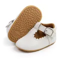 Detailed view of white baby princess shoes with non-slip rubber sole and scalloped edges - 11cm / White