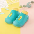 Breathable turquoise baby sock shoes with soft rubber soles and yellow trim - Internal Length 11.5cm / Green Cloth Label