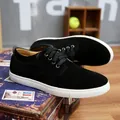 Classic black suede men's casual board shoes with white sole on vintage suitcase - 38 / Black