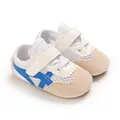 Detailed view of breathable mesh baby walking shoes with soft soles and blue stripes - Blue (Mesh)