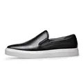 Men's black pebble grain leather slip-on sneakers featuring a durable white rubber sole - 38 / Black Solid Shoes