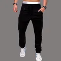 Close-up of men's black joggers with double zippers and ribbed motorcycle style panels. - M / Bottoms / Black