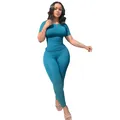 Full view of teal rib-knit set showing the flexible fit and textured fabric on female model - S / Top And Bottom / Blue