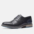 Seitenansicht der schwarzen Business-Lederschuhe mit blauen Nähten-Details - US 7 / Schwarz (KD6608)