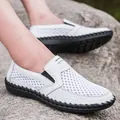 Stylish breathable white mesh slip-on casual sneakers for men with durable black rubber sole - White