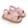 Detalle de sandalias de cuero rosa para bebés con suela blanda y transpirable para verano - Rosa