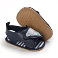 Detailed view of navy blue baby shark sandals with soft non-slip sole for active toddlers - Dark Blue