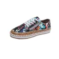 Detailed side view showing ethnic floral print and cork sole of platform sneakers - 36 / Black Floral