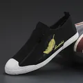 Breathable black mesh men's slip-on sneaker with zipper and yellow feather embroidery - 38 / Black and White