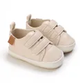 Detailed view of beige infant soft sole walking shoes with double velcro straps - Beige