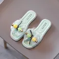 Stylish girls' mint green summer slides featuring a decorative bow and colorful beads - Green