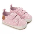 Pink soft sole infant walker shoes featuring white heart patterns and velcro straps - D73 Pink Heart