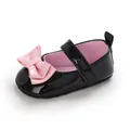 Detail schwarzer Lack-Lauflernschuhe für Babys mit großer rosa Schleife und weicher Sohle - Schwarz
