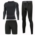 Detailed view of men's black three-piece sports compression set for training and running - S / Set / Black Gray (1039)