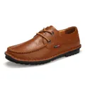 Classic brown men's casual leather shoes featuring premium hand-stitched detailing and laces - Brown
