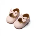 Elegante roze baby prinsessenschoenen met een lederen textuur en decoratieve strik - 11cm / Roze