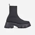 Side profile view showing detail of black knitted sock boot with chunky lug sole - 35 / Black