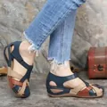 Detailed side view of women's comfortable color-block wedge sandals with velcro straps - 35 / Blue