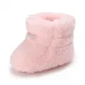 Bottine d'hiver en peluche rose pour bébé montrant la texture douce de la polaire. - Rose