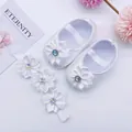 Detailed view of white satin baby princess shoes and matching floral headband set for infants - Size 11 / Rhinestone Flower (White) / White