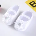 Detailed view of white satin infant princess shoes featuring elegant flower and crystal accents - Size 11 / Rhinestone Flower White (GZ809)