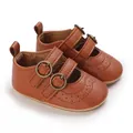 Detailed macro view of brown baby Mary Jane shoes with double buckles and soft soles. - Inner Length 11cm / With Prong / Brown