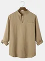 Detailed view of khaki men's casual cotton shirt featuring a V-neckline and front pocket - S / Tops / Brown