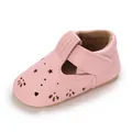 Close-up detail of a pink soft leather baby walking shoe featuring star and flower cutouts - Inner Length 11cm / Pink