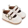Detail of white baby Mary Jane shoes with bronze buckles and brogue texture - Inner Length 11cm / Needle-Free / White